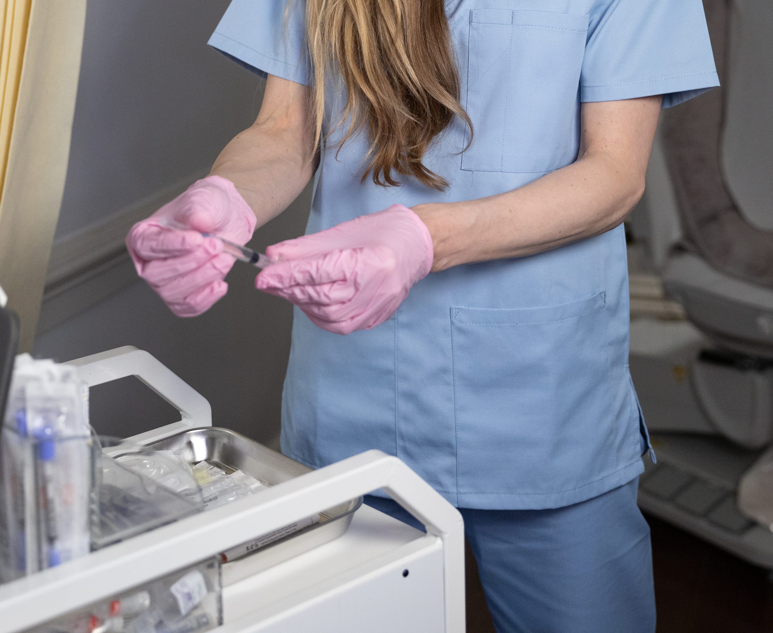 Surgeon preparing for Labiaplasty.